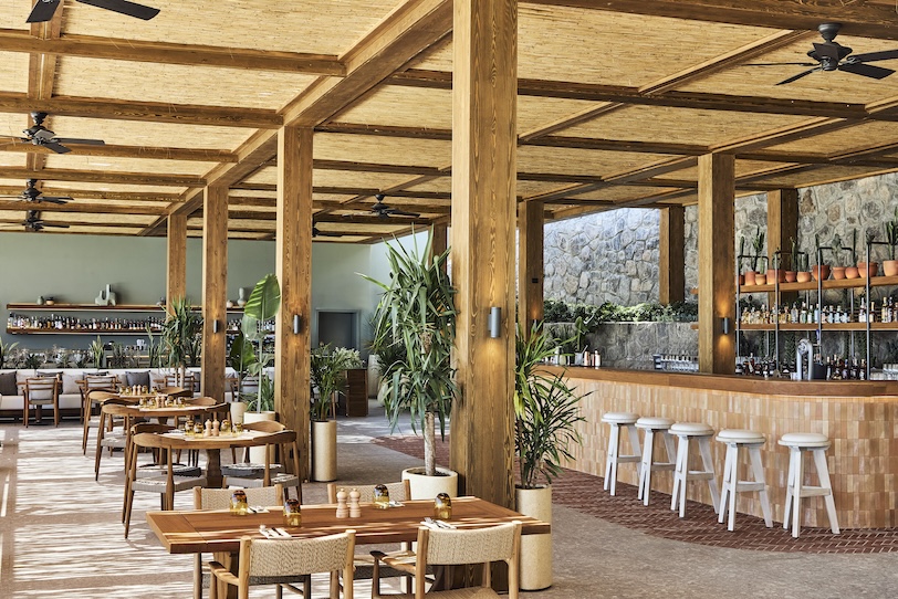 Outdoor covered dining area with bar