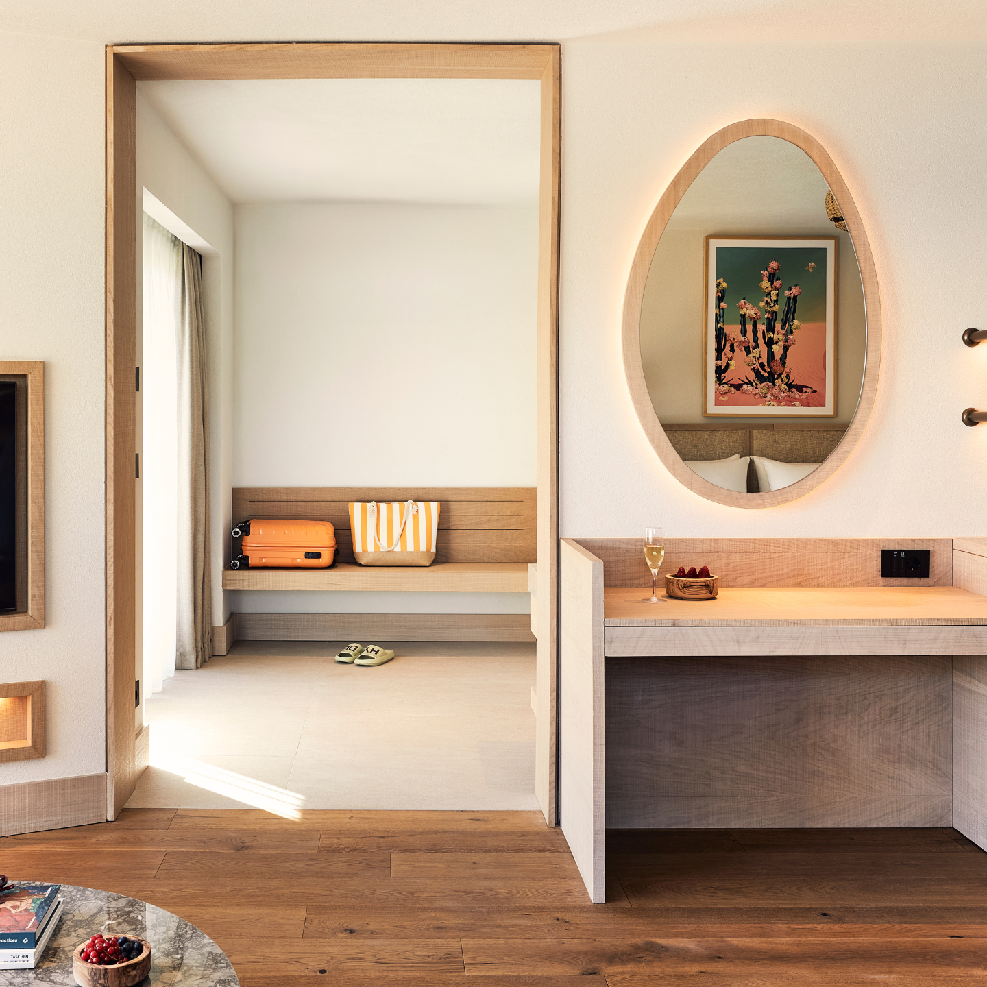 Image of a bedroom opening up to a large secondary room